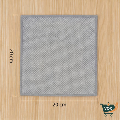 Gray square mat with dimensions on a wooden surface, featuring the VOX brand.