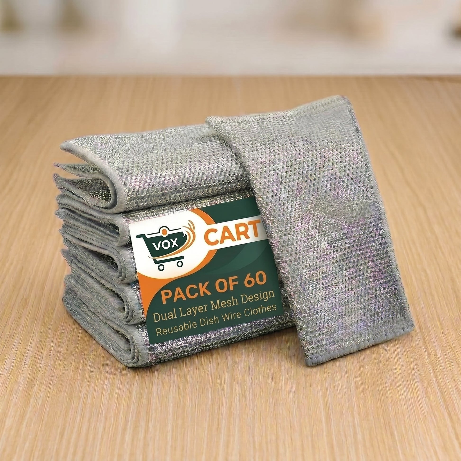 Stack of VOX CART reusable dish wire clothes on a wooden surface